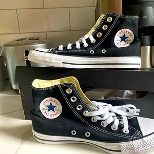New with tags Converse black high tops. Women’s size 8.5.